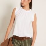 Top lino sin mangas cuello volante blanco