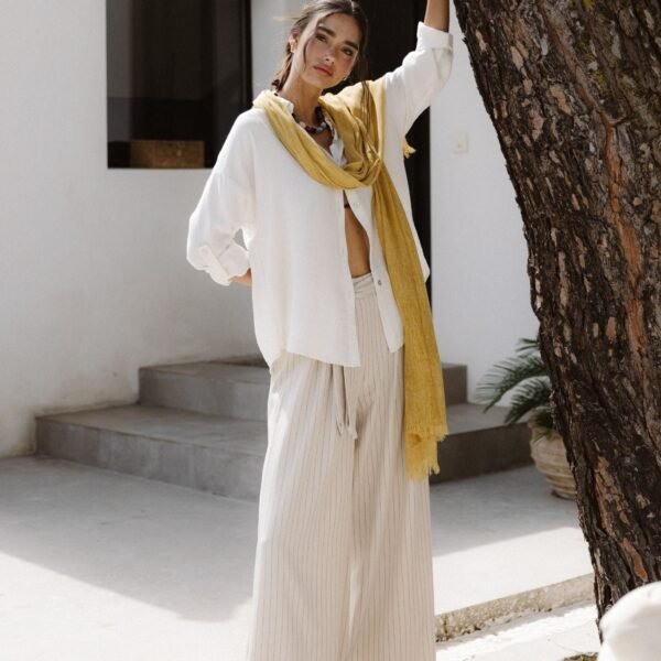 Pantalón fluido rayas beige